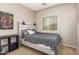 Bedroom with a queen bed and storage at 12425 W Pima St, Avondale, AZ 85323