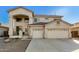 Two-story house with double garage and desert landscaping at 12425 W Pima St, Avondale, AZ 85323