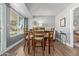 Casual dining area with a wood table and four chairs at 13635 N Emberwood Dr, Sun City, AZ 85351