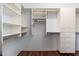 Large walk-in closet with shelves and drawers at 15583 W Big Sky Dr, Surprise, AZ 85374