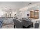 Spacious dining room with built-in shelving and chandelier at 15583 W Big Sky Dr, Surprise, AZ 85374