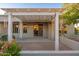 Covered patio with access to the interior of the home at 15583 W Big Sky Dr, Surprise, AZ 85374