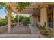 Relaxing brick patio area with pergola cover at 15583 W Big Sky Dr, Surprise, AZ 85374