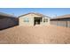 Backyard of the house featuring gravel ground covering at 19959 W Rancho Dr, Litchfield Park, AZ 85340