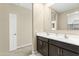 Bathroom with double vanity and mirror at 19959 W Rancho Dr, Litchfield Park, AZ 85340