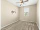 Small bedroom with window and wall mount at 19959 W Rancho Dr, Litchfield Park, AZ 85340