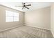 Spacious bedroom with neutral walls and carpeted floors at 19959 W Rancho Dr, Litchfield Park, AZ 85340