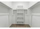 Walk-in closet with hanging rods and shelves at 19959 W Rancho Dr, Litchfield Park, AZ 85340