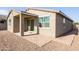 Rear exterior view with patio and walkway at 19959 W Rancho Dr, Litchfield Park, AZ 85340