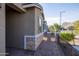 Brick walkway leads to the entrance of the house, with stone accents at 19959 W Rancho Dr, Litchfield Park, AZ 85340
