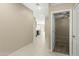 View down a hallway leading to the kitchen and other rooms at 19959 W Rancho Dr, Litchfield Park, AZ 85340