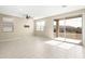Bright living area with sliding glass doors leading to the backyard at 19959 W Rancho Dr, Litchfield Park, AZ 85340