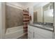 Bathroom with a shower/tub combo and granite countertop at 20487 W Minnezona Ave, Buckeye, AZ 85396