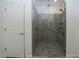 Modern bathroom with a large walk-in shower and glass enclosure at 20487 W Minnezona Ave, Buckeye, AZ 85396
