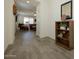 View through entryway to living room with tile floors at 20487 W Minnezona Ave, Buckeye, AZ 85396