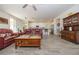Open living room with leather sofas and kitchen views at 20487 W Minnezona Ave, Buckeye, AZ 85396