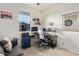 Bright home office with desk and two monitors at 20975 W Monte Vista Rd, Buckeye, AZ 85396