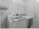 Bright laundry room with LG washer and dryer and ample shelving at 2131 E Haflinger Way, San Tan Valley, AZ 85140