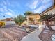 Backyard patio with pergola, gravel, and desert plants at 21603 N Yellowstone Ct, Sun City West, AZ 85375