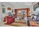 Relaxing living room with sliding glass doors leading to a patio at 21603 N Yellowstone Ct, Sun City West, AZ 85375