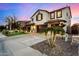 Lovely two-story house with a three-car garage and manicured lawn at 25320 N 52Nd Ave, Phoenix, AZ 85083