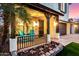 Inviting front porch with teal chairs and landscaping at 25320 N 52Nd Ave, Phoenix, AZ 85083