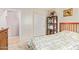 Bedroom with a double bed and access to another room at 25564 W Ripple Rd, Buckeye, AZ 85326