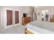 Main bedroom with double doors leading to the backyard at 25564 W Ripple Rd, Buckeye, AZ 85326