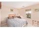 Cozy bedroom with a comfortable bed and plenty of natural light at 25564 W Ripple Rd, Buckeye, AZ 85326