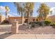 Single-story home with desert landscaping and two-car garage at 26209 S Greencastle Dr, Sun Lakes, AZ 85248