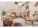 Bright living room with vaulted ceilings and wooden accents at 26209 S Greencastle Dr, Sun Lakes, AZ 85248