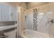 Bathroom featuring tiled shower and tub with white cabinets at 36925 N Stoneware Dr, Queen Creek, AZ 85140