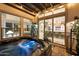 Hot tub with view into the kitchen and dining area at 36925 N Stoneware Dr, Queen Creek, AZ 85140