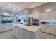 Spacious kitchen with an island, stainless steel appliances, and custom cabinetry at 36925 N Stoneware Dr, Queen Creek, AZ 85140