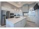 Beautiful kitchen featuring stainless appliances, island, and ample counter space, perfect for cooking and entertaining at 36925 N Stoneware Dr, Queen Creek, AZ 85140
