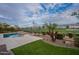 Enjoy backyard views with a patio, golf course and landscaping with a pool for outdoor enjoyment at 36925 N Stoneware Dr, Queen Creek, AZ 85140