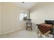 Cozy bedroom with a rocking chair and a window seat at 3835 E Thunderhill Pl, Phoenix, AZ 85044