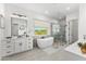 Spa-like bathroom with soaking tub, walk-in shower, and double vanity at 39015 N 6Th Dr, Phoenix, AZ 85086