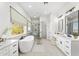 Luxurious bathroom with a soaking tub and double vanities at 39015 N 6Th Dr, Phoenix, AZ 85086