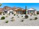 Stunning modern farmhouse exterior with mountain views and desert landscaping at 39015 N 6Th Dr, Phoenix, AZ 85086