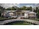 A charming ranch-style home with a landscaped front yard and mountain backdrop at 39015 N 6Th Dr, Phoenix, AZ 85086