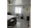 Large bedroom with a queen bed and window coverings at 4016 W Wagon Wheel Dr, Phoenix, AZ 85051