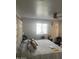 Spacious primary bedroom with large bed and window at 4016 W Wagon Wheel Dr, Phoenix, AZ 85051