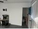 Bright bedroom with game console and access to laundry at 4016 W Wagon Wheel Dr, Phoenix, AZ 85051