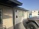 Side view of the house, showcasing stonework and landscaping at 4016 W Wagon Wheel Dr, Phoenix, AZ 85051