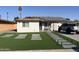 Remodeled home with artificial turf and solar panels at 4016 W Wagon Wheel Dr, Phoenix, AZ 85051