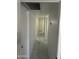 Long hallway with white walls and tile flooring at 4016 W Wagon Wheel Dr, Phoenix, AZ 85051