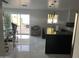 Modern kitchen with island and access to backyard at 4016 W Wagon Wheel Dr, Phoenix, AZ 85051