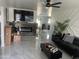 Modern living room with a fireplace and large TV at 4016 W Wagon Wheel Dr, Phoenix, AZ 85051