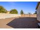 Backyard view with gravel and block wall at 4550 E Dublin St, Gilbert, AZ 85295